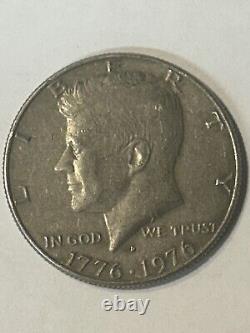 1776-1976 D Kennedy Half Dollar Coin Very Good Condition