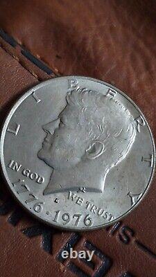 1776-1976-D kennedy bicentennial half dollar. Good USED condition. Not graded