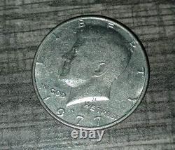 1977 kennedy half dollar strange D Mint Mark Error Rare