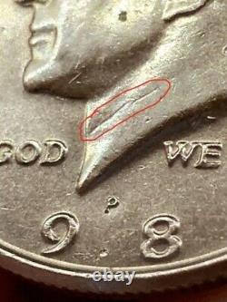 1989 p Kennedy half a dollar with error in the neck