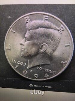 1994-P clad Kennedy half Dollar. Error coin. Drool marks