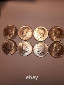 8 Uncirculated pre 1965 Kennedy Half Dollars