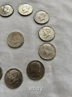 Lot of 11 Kennedy half dollar silver coins including one proof coin Gift idea