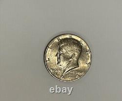 Rare 1974 Kennedy half dollar coin (no mint mark, circulated)