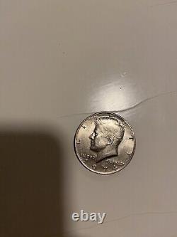 Rare 1974 Kennedy half dollar coin (no mint mark, circulated)