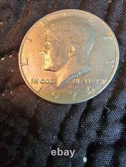 Rare 1974 Kennedy half dollar coin (no mint mark, circulated) Error