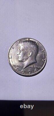 Rare 1974 Kennedy half dollar coin (no mint mark, circulated) Error