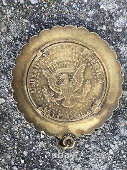 Vintage 1964 Gold Kennedy Liberty Half Dollar coin with vintage gold pendant